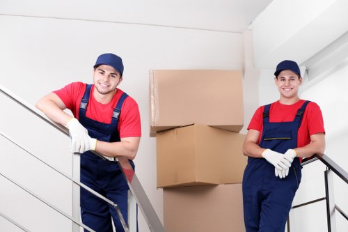 Packed household boxes and furniture ready for a local move