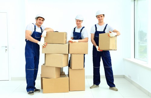Mover checking a property route before lifting furniture