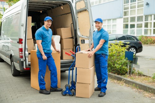 Team handling furniture during a house move near Clapham Park