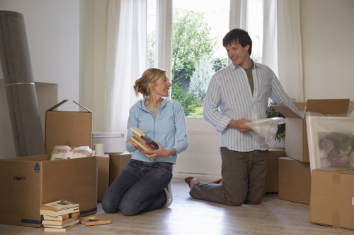 Moving boxes and household items illustrating cubic-yard rates