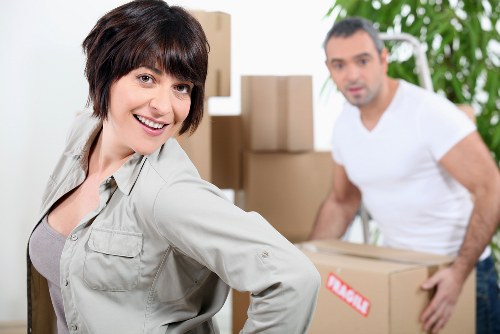 Claphampark movers transporting furniture during a residential relocation