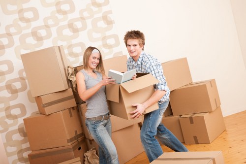 Local moving team helping with furniture loading near Clapham Park