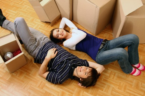 Household furniture being carefully loaded for relocation