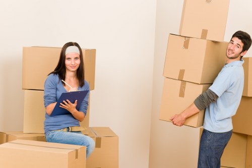 Packed boxes and furniture ready for removals in Claphampark